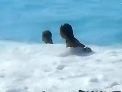 Accidental nudity shown in wavy water