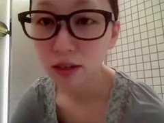 Asian women record their reactions as they were shitting