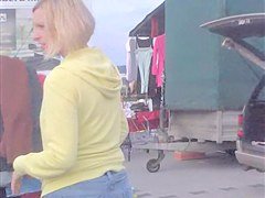Blonde smiles into cam flashing the hot downblouse