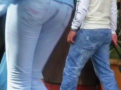 Brunette flaunts her massive booty in jeans for the candid cam