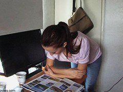 Brunette vixen reading a paper in a down blouse video