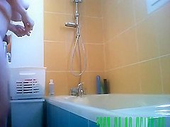 Chick with trimmed pussy washes body