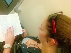 Down blouse in chick reading a book
