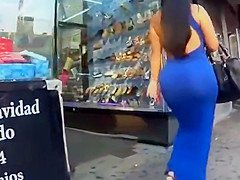 Latina beauty in tight blue dress