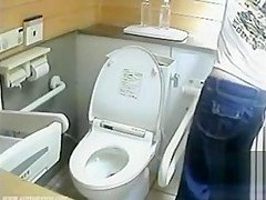 Lovely Japanese chicks pee in a public toilet