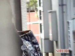 Outdoor sharking scene of cute oriental bitch being really surprised