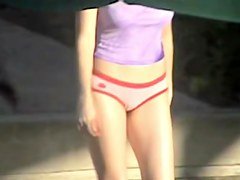 Sweet amateur pulls top down and flashes nude boobs
