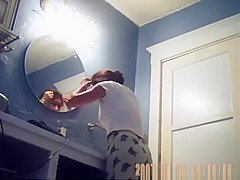 Woman spied before and after shower