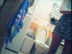 Girl in polka dot dress upskirt masturbation in toilet